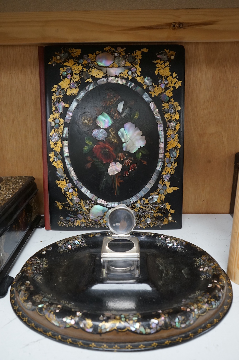 A group of Victorian japanned papier-mâché desk items and boxes (5). Blotter 24cm wide x 31cm high